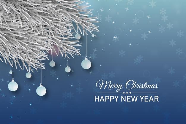 霜冻圣诞树枝装饰蓝色背景